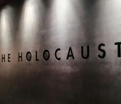 A wall with the words "The Holocaust" engraved in it