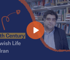 Title slide reading “20th Century Jewish Life in Iran,” showing a man seated in front of bookshelves, with a play button overlay indicating a video.