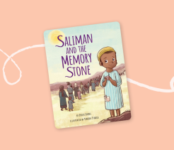 Cover of the children’s book Saliman and the Memory Stone, illustrated with a young boy standing in the foreground while a group of people walk together across a desert landscape.