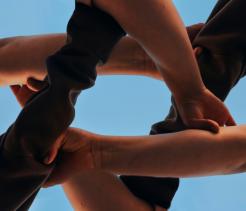 Friends put hand in hand the concept of a friend connection that make Star of David hands