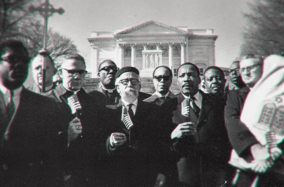March on Washington for Jobs and Freedom in 1963. It features Dr. Martin Luther King Jr. alongside Rabbi Joachim Prinz, Rabbi Abraham Joshua Heschel